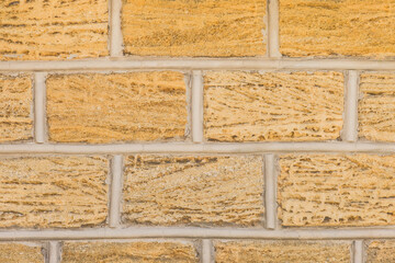 Shell sand yellow brick blocks exterior wall texture background