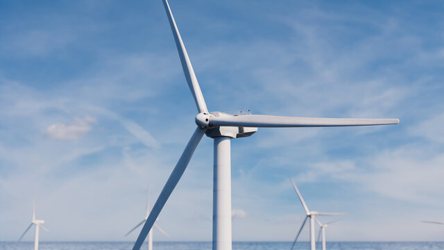 Wind Turbines. Offshore Wind Farm on a Hazy Afternoon. Renewable Electricity Concept.