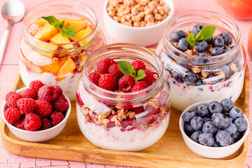 Healthy breakfast. Granola / muesli yoghurt and fruit.