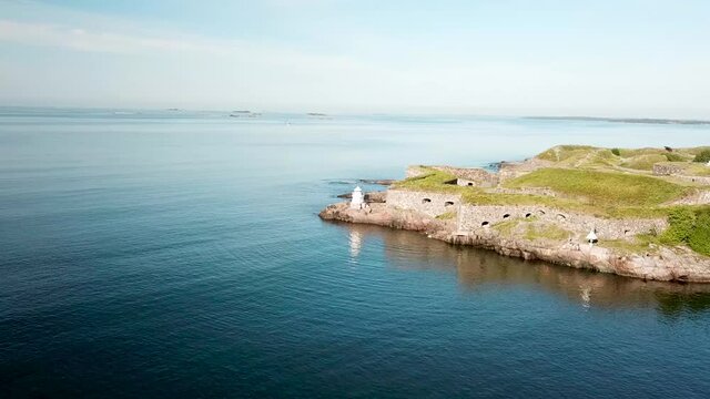 Cinematic shot , aerial view of Bastions of finnish fortress Suomenlinna (or sweeden name Sveaborg) at the coast of Baltic sea near Helsinki city, Finland. Sunny day