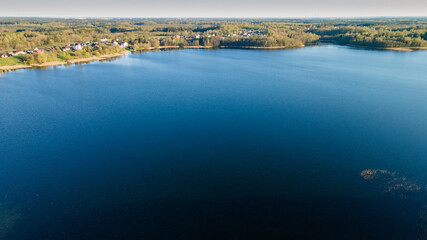 Aerial view of the lake or river with pattern wave. Water surface with ripples texture background. Viewed from above. Environment concept.
