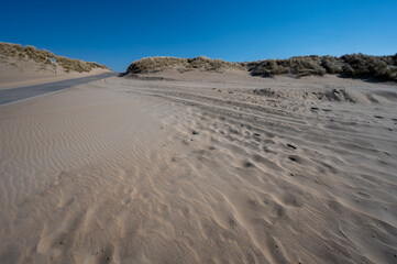 View on wide white sandy North sea beach in Renesse, Zeeland, Netherlands
