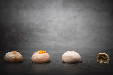 Traditional Chinese pastry against dark background for food and bakery concept
