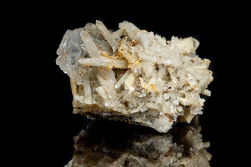 Macro mineral stone fluorite with quartz against black background