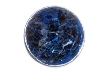 Macro mineral stone Sodalite ball on white background