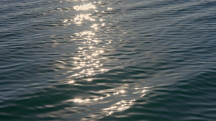 Close up of disturbed blue ocean water surface. Slow motion