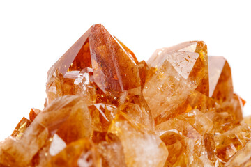 Macro mineral stone Citrine in rock in crystals on a white background