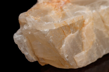Macro mineral stone Moonstone a black background
