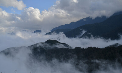 Foggy landscape clouds cover mountains and forests in the afternoon time of Vietnam.