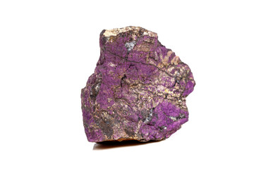 Macro mineral stone purpureus, (purple) purpurite in the breed a white background