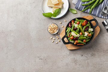 Delicious salad with green beans, mushrooms and cheese on light grey table, flat lay. Space for text