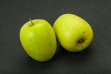 Two ripe green sweet apples