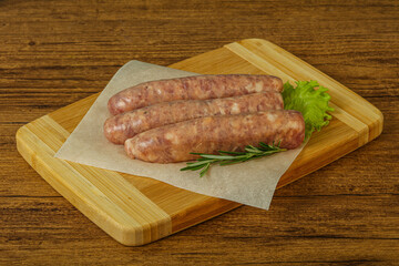 Raw pork meat sausages for grill