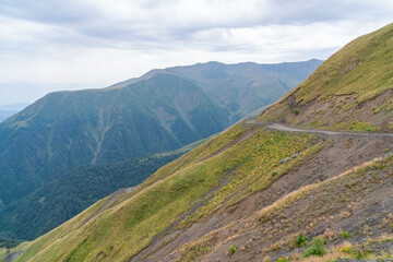 Fototapeta na wymiar Beautiful view of Abano Gorge in Tusheti, dangerous mountain road in Georgia