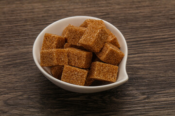 Cane sugar cubs in the bowl