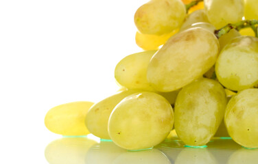 One bunch of organic juicy green grapes, close-up, isolated on white.