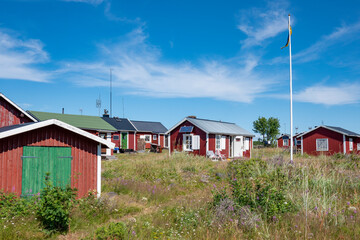 Fototapeta na wymiar Sandskar Island with Small idyllic Maritime fishing settlement in Haparanda archipelago National Park in Norrbotten County, Sweden.