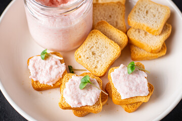 Smorrebrod butter spread shrimp on bread capelin roe seafood taste fresh portion ready to eat meal snack on the table copy space food background rustic. top view pescetarian diet vegetarian food 