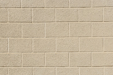 Light dirty sand brick block stone pattern surface wall texture background