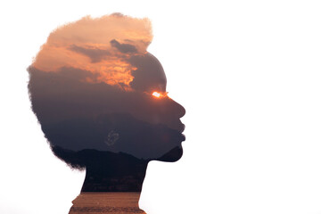 Multiple exposure image with sunrise and eye on fire inside woman silhouette. Psychology and anger management control concept.