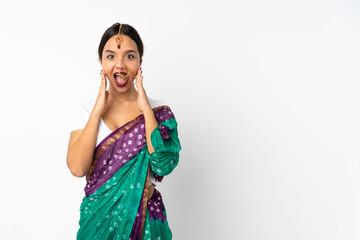 Young indian woman isolated on white background with surprise and shocked facial expression