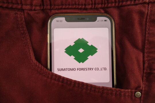 KONSKIE, POLAND - August 17, 2021: Sumitomo Forestry logo on mobile phone hidden in jeans pocket