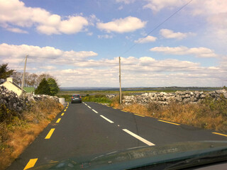 Ireland Fields. Beautiful green island, full of green grasses, hills, hills, everything picturesque like from a fairy tale.