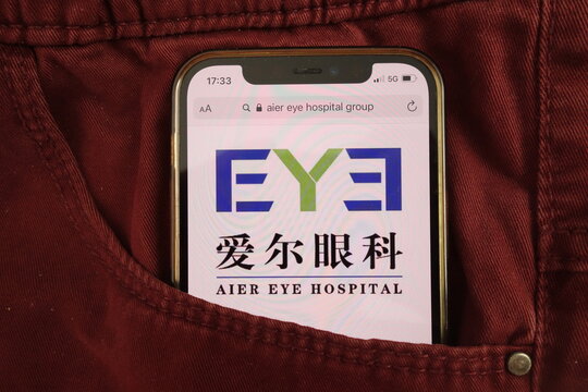 KONSKIE, POLAND - August 17, 2021: Aier Eye Hospital Group Co Ltd logo on mobile phone hidden in jeans pocket