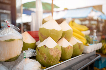 Close up.Coconuts fruit market on the street in Bangkok, Thailand.