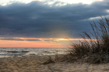 Picturesque view of beautiful sky with clouds over tropical beach at sunset