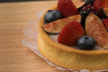 tart with berries table close up