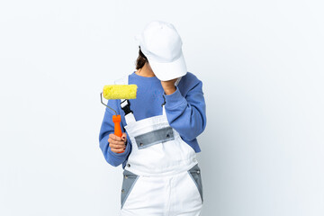 Painter woman over isolated white background with headache
