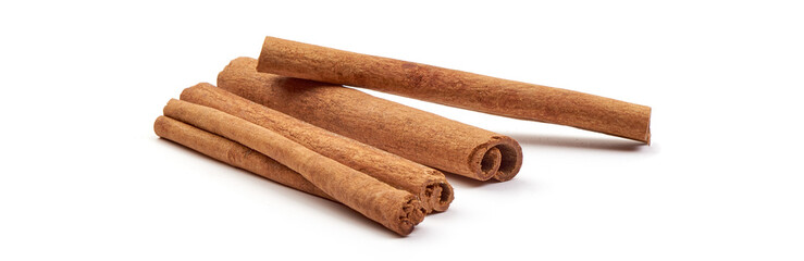 Cinnamon sticks, close-up, isolated on white background.