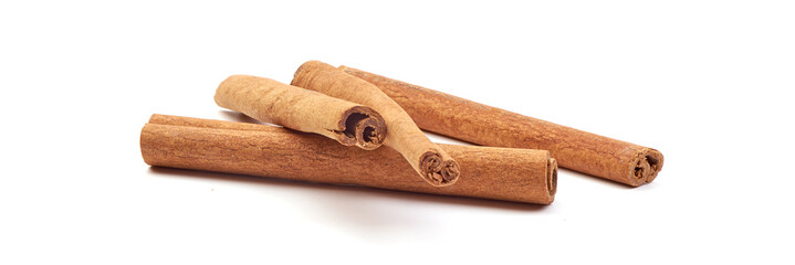 Cinnamon sticks, close-up, isolated on white background.