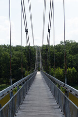 Pedestrian suspension bridge over river Neman