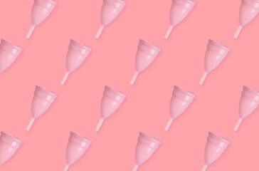 Many menstrual cups on pink background, flat lay. Pattern design