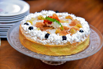 fruit quiche and marshmallow on wooden table
