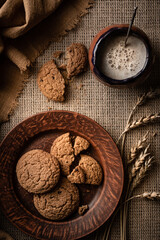 oatmeal cookies with cappuccino dark plate. High quality photo