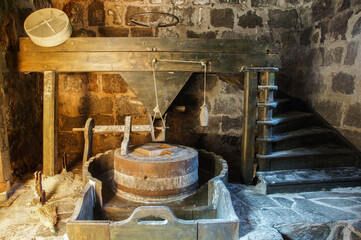 Ancient Turkish water mill for grinding, flour grinding device, Rize, Turkey - obrazy, fototapety, plakaty