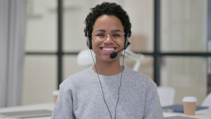 Smiling African Woman Wearing Headset with Mic 