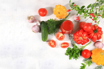 Fototapeta na wymiar Tomato juice, fresh tomatoes, squash, garlic and peppers. Choice of foods with vitamin C during coronavirus infections Detox diet and weight loss concept, natural nutrition,