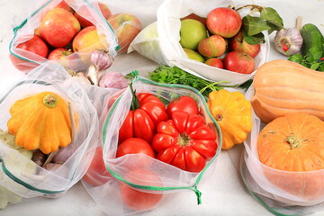 Healthy natural vegetables in eco bags, healthy lifestyle concept, zero waste. Food delivery, donation, quarantine from coronavirus. Vegetables, fruits and greens in cloth packaging, vegetarian