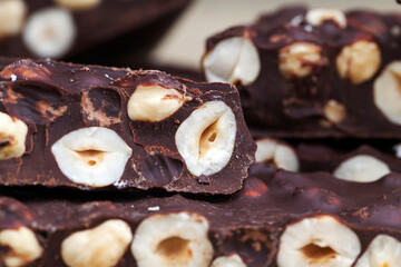 milk chocolate with whole and chunks of hazelnuts