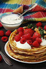 Russian cuisine national dish bliny with fresh berries