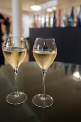 Tasting of brut champagne sparkling wine during visit caves in champagne house in Reims, France