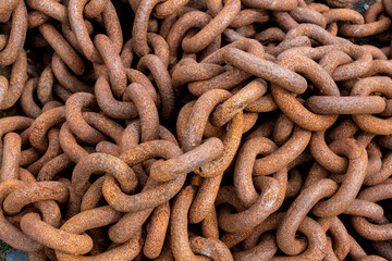 Close-up of rusty chain. Closeup of a bunch of rusty chains. Overhead shot of rusty metal chains in a bunch