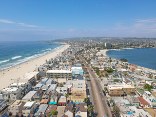 Aerial view of Mission Bay and beach in San Diego during summer, California. USA. Community built on a sandbar with villas, sea port and recreational Mission Bay Park.