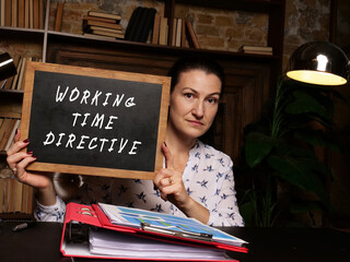Fototapeta premium Business concept about WORKING TIME DIRECTIVE with inscription on the chalkboard