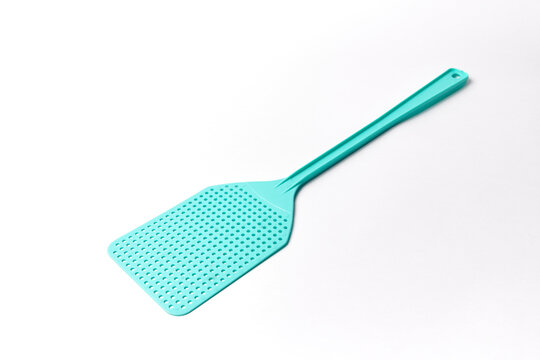 Plastic fly swatter isolated on white, plastic object used to kill a mosquito or any other bug. Also calles fly killer or pest control tool	