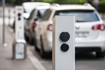 Selective blur on an electric car charging station used to fill with electricity electrical vehicles, mainly cars, in Ljubljana, slovenia, abiding by European electricity standards...